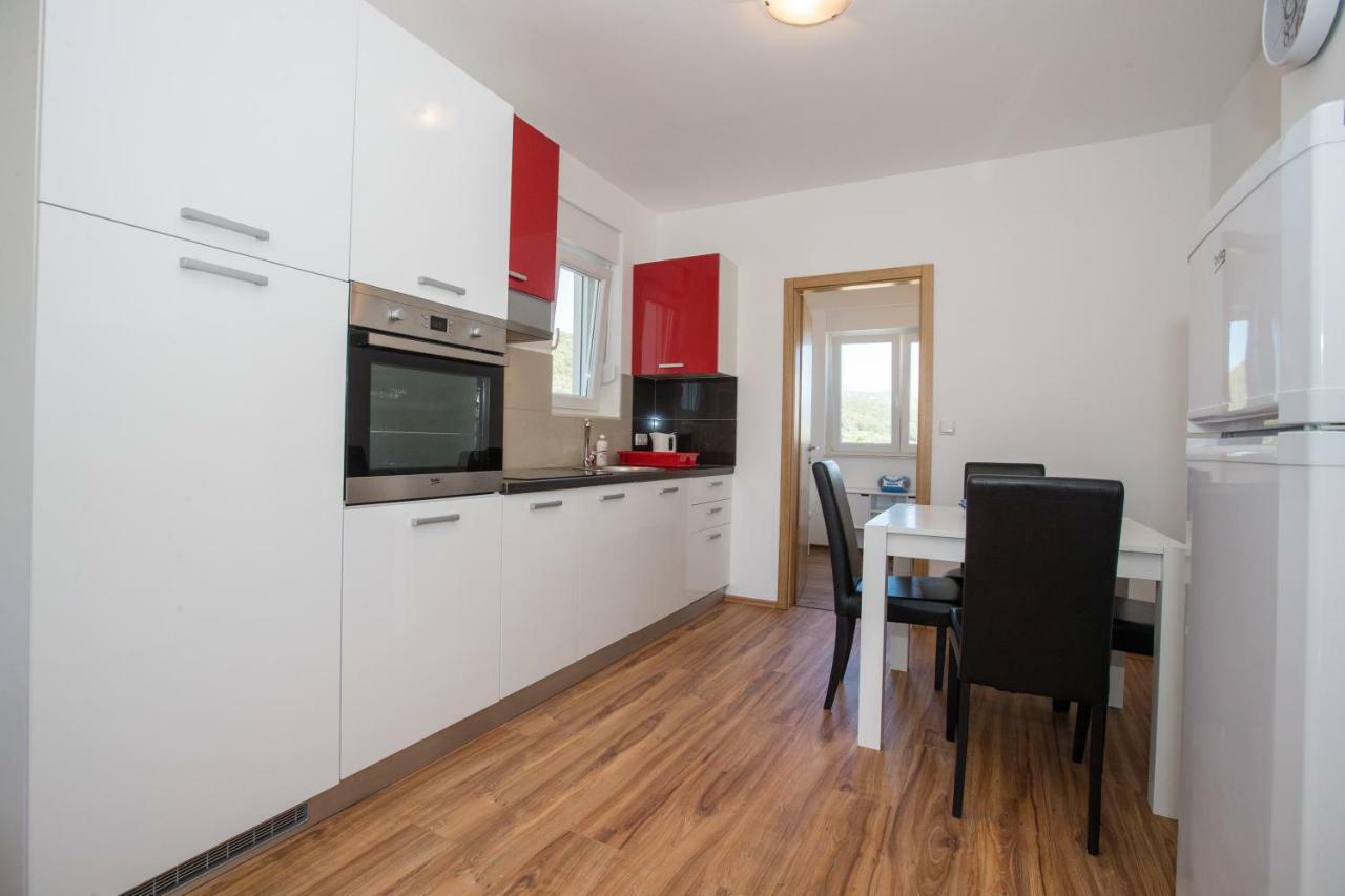 Apartments Petrusic Supetarska Draga Extérieur photo